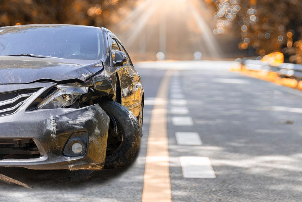 car showing damage caused by a motor vehicle accident 