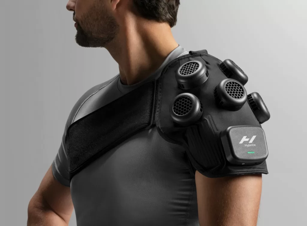 Person wearing hyperice x shoulder